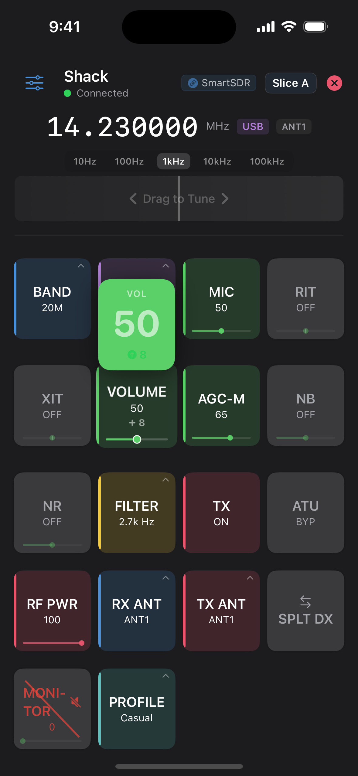 ControlDeck on iPhone — dragging the VOLUME control, with a floating live-value readout and scrub track; RF power set to 100